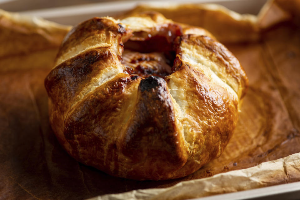 This November 2018 photo shows a recipe for Baked Brie en Croute with Raspberry Jam. (Cheyenne M. Cohen via AP)