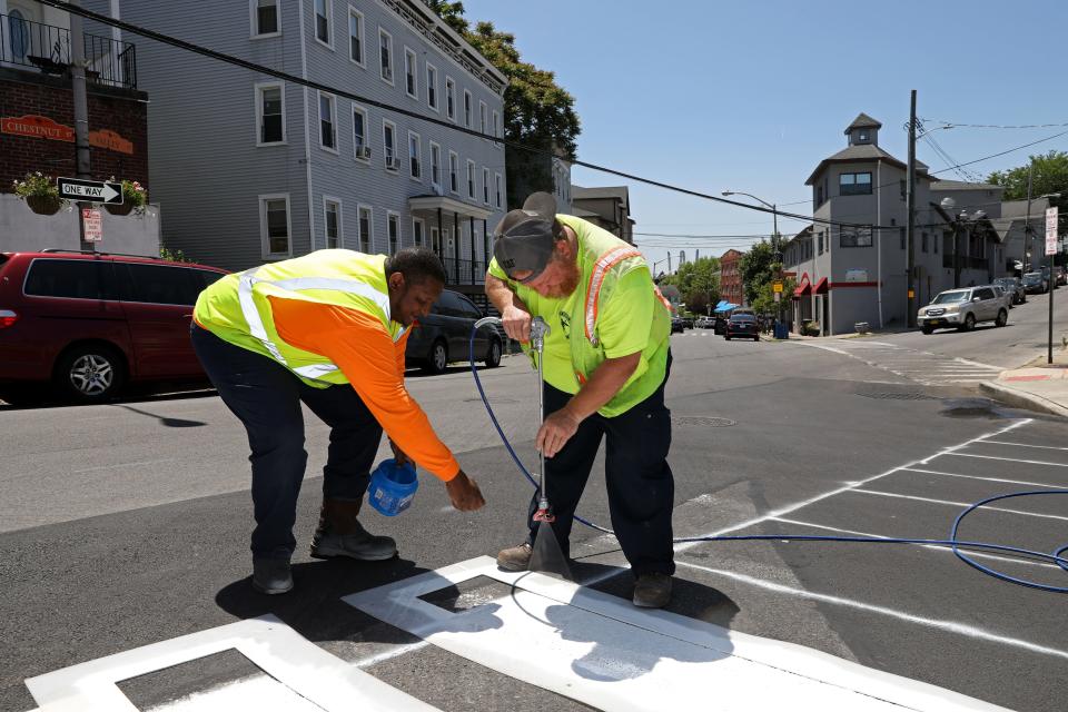 Valley Business District crosswalk painting.