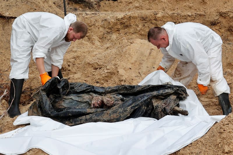 Exhumation of bodies of Ukrainian soldiers from a mass grave in Izium