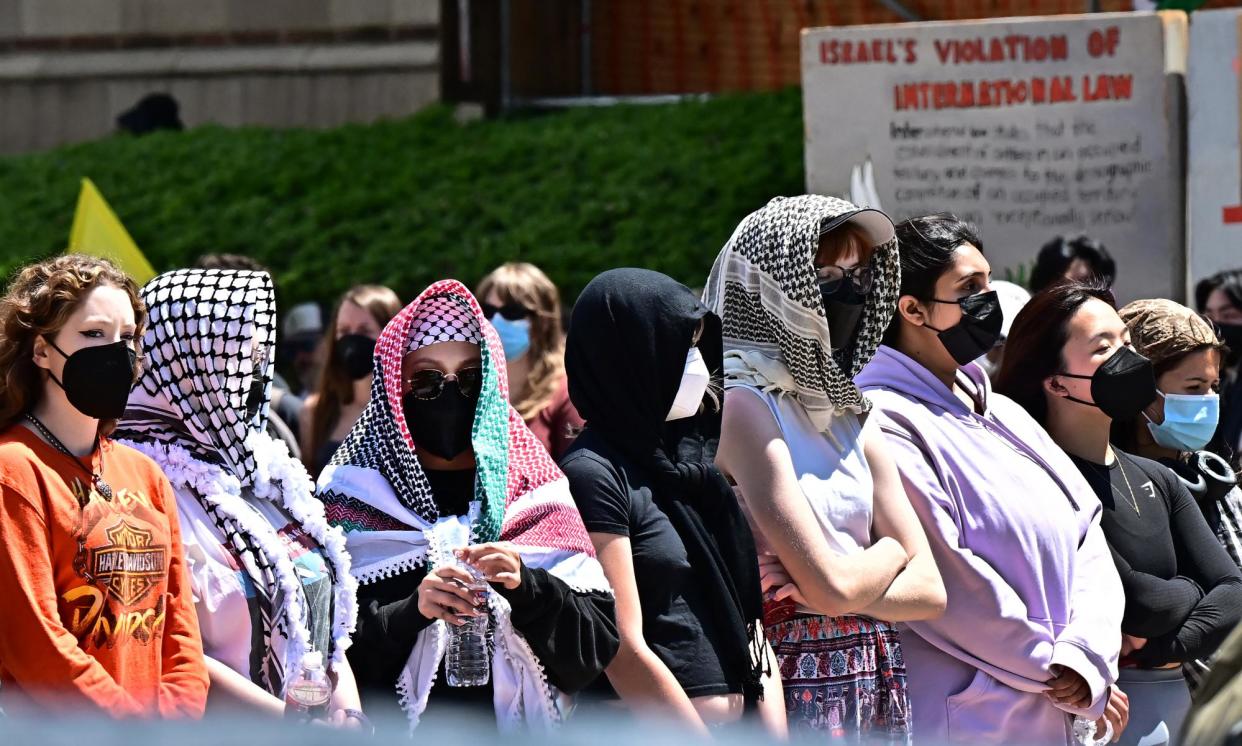 <span>Pro-Palestinian students protest at an encampment on the campus of the University of California, Los Angeles on Friday.</span><span>Photograph: Frederic J Brown/AFP/Getty Images</span>