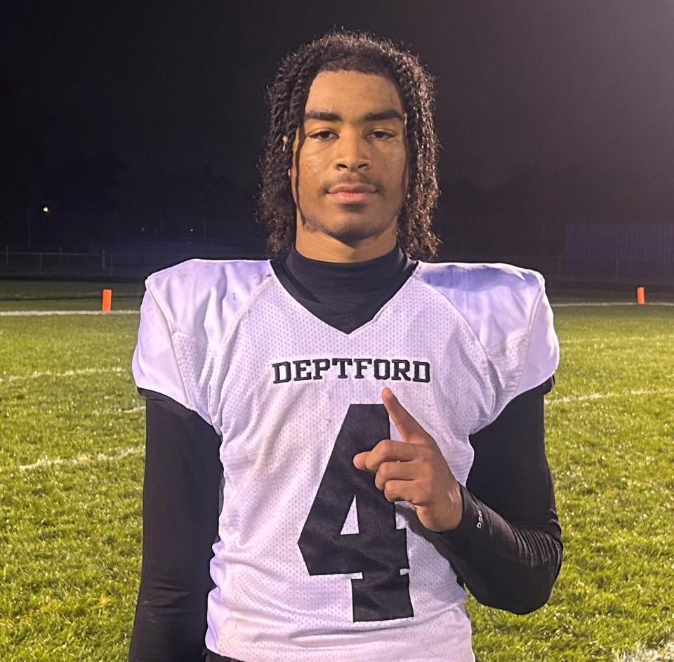 CJ Carter is the starting quarterback, safety, punter and kicker for the Deptford High School football team. He performed all of his roles admirably during the Spartans'  first win of the season on Friday.