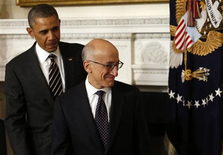 U.S. President Barack Obama and his nominee for Chairman of the Commodity Futures Trading Commission (CFTC) Tim Massad depart after the announcement at the White House in Washington November 12, 2013. REUTERS/Kevin Lamarque