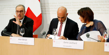 Swiss Defence Minister Guy Parmelin (L-R), Interior Minister Alain Berset and Energy Minister Doris Leuthard attend a news conference in Bern, September 25, 2016. REUTERS/Ruben Sprich