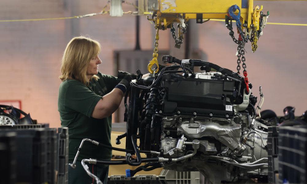 A worker at a Jaguar Land Rover factory