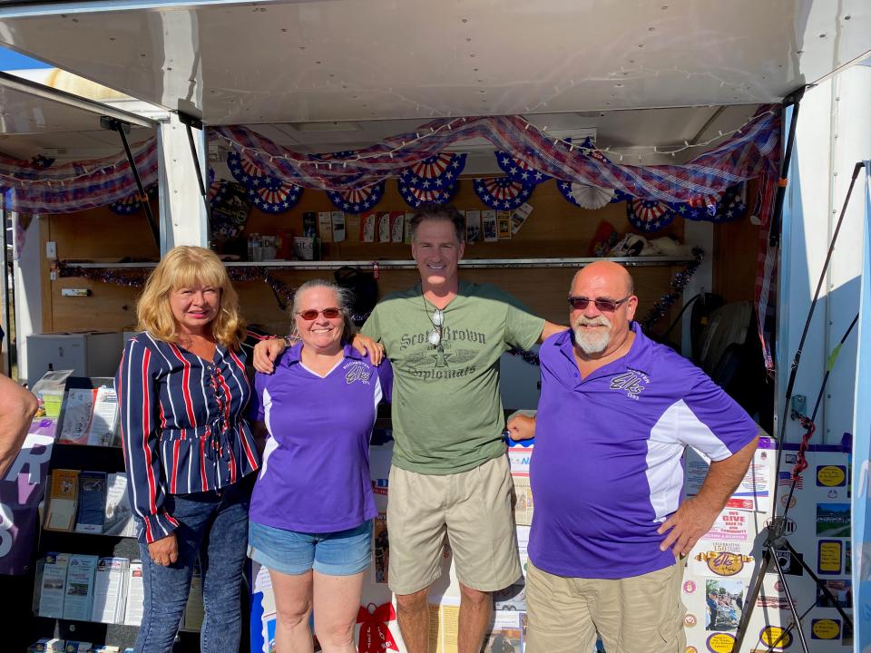 From left to right are: Gail Huff Brown, wife of former US Senator Scott Brown; Deanna Souza, Lodge Loyal Knight; Scott Brown, former US Senator and Jim Clark, Past Exalted Ruler and Lodge Trustee, at the Lilac Fun Fest in Rochester.