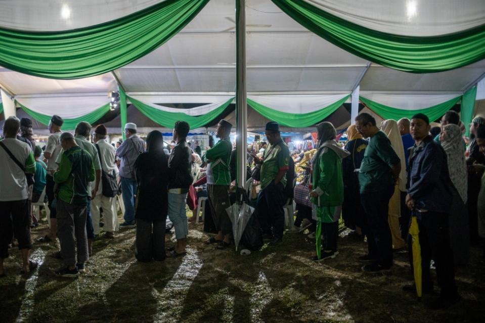 With the party's muktamar this year choosing to display solidarity with Palestine, many of the hundreds of supporters present chose to wear attire in support of their fellow Muslims if not the party's green. ― Picture by Shafwan Zaidon