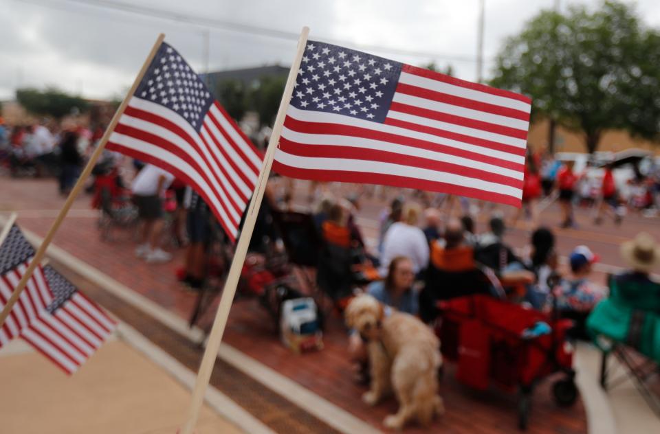 American flags fly during the 31st annual 4th on Broadway Independence Day parade and festival Saturday, July 3rd, 2021. (Mark Rogers/For A-J Media)