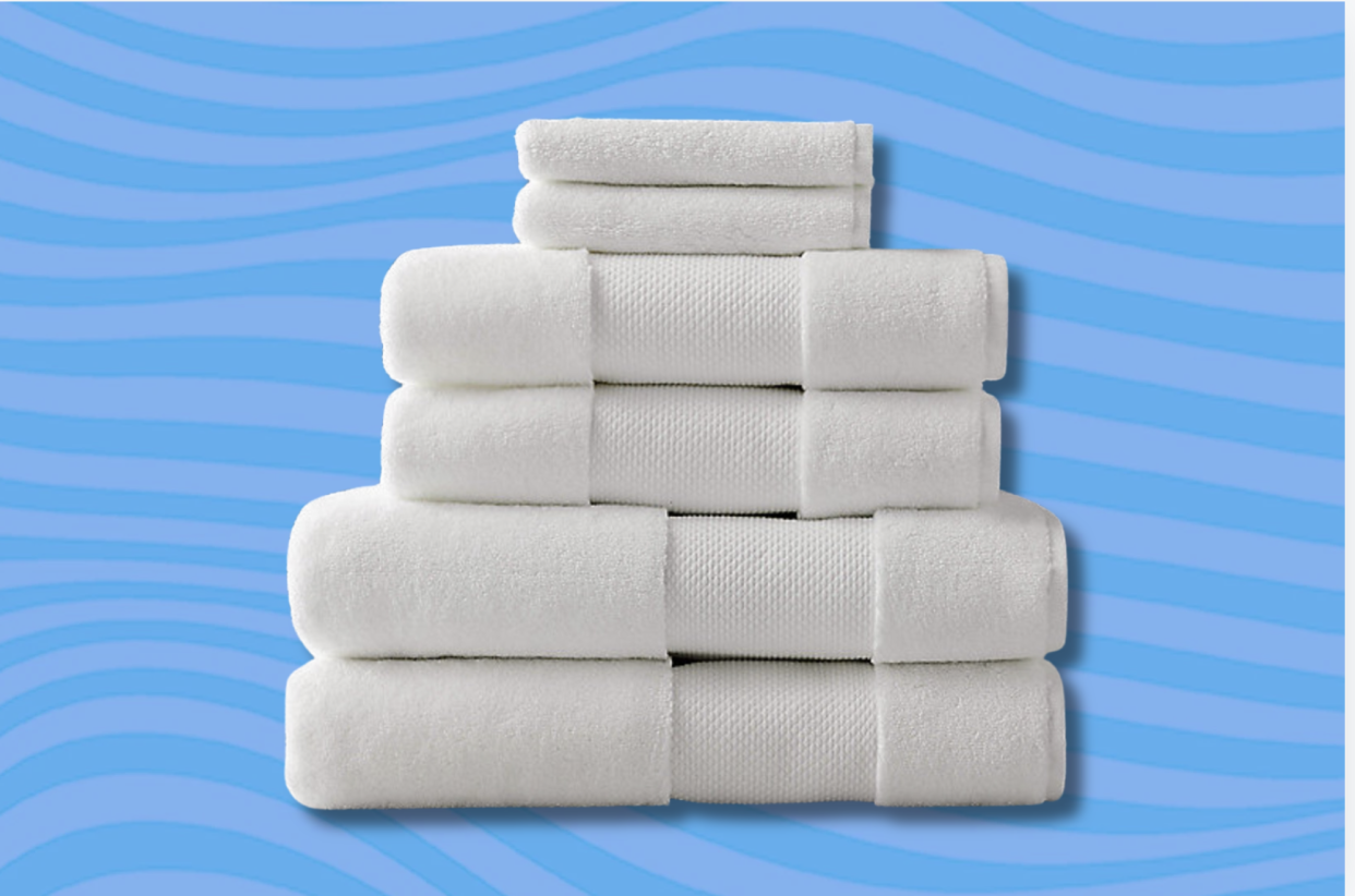 A stack of white Frontgate Resort Towels is shown for Yahoo's Best Bath Towel guide.