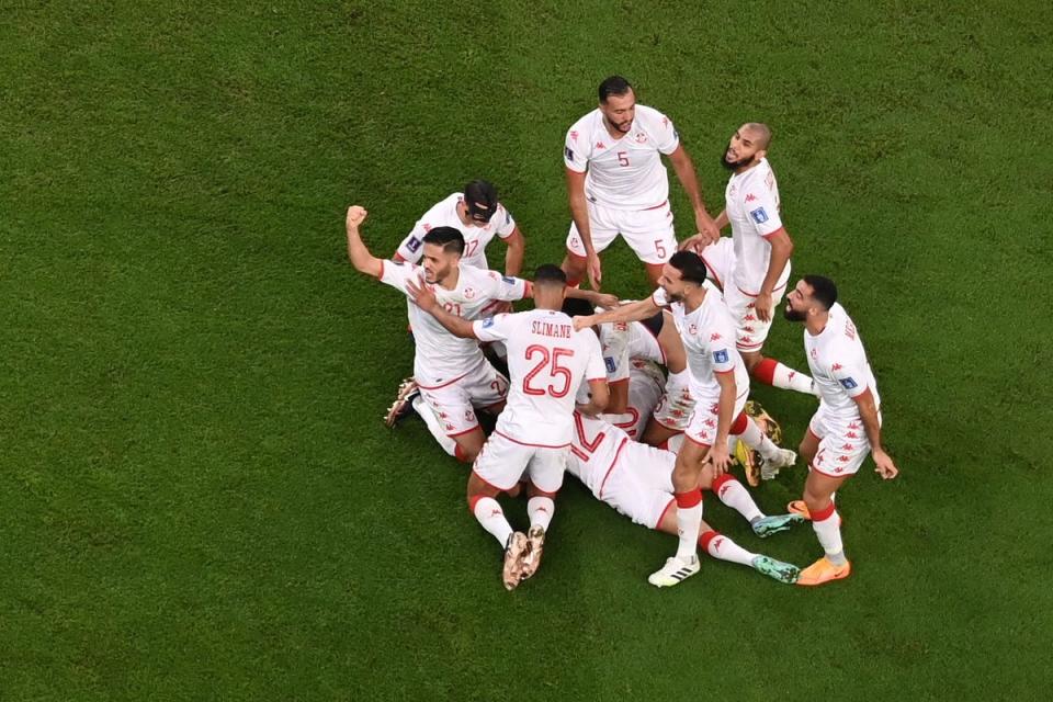 Wahbi Khazri celebrates scoring the opening goal (AFP via Getty Images)