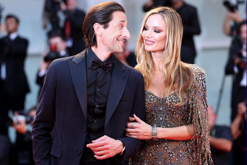 Adrien Brody and Georgina Chapman attend the "Blonde" red carpet at the 79th Venice International Film Festival
