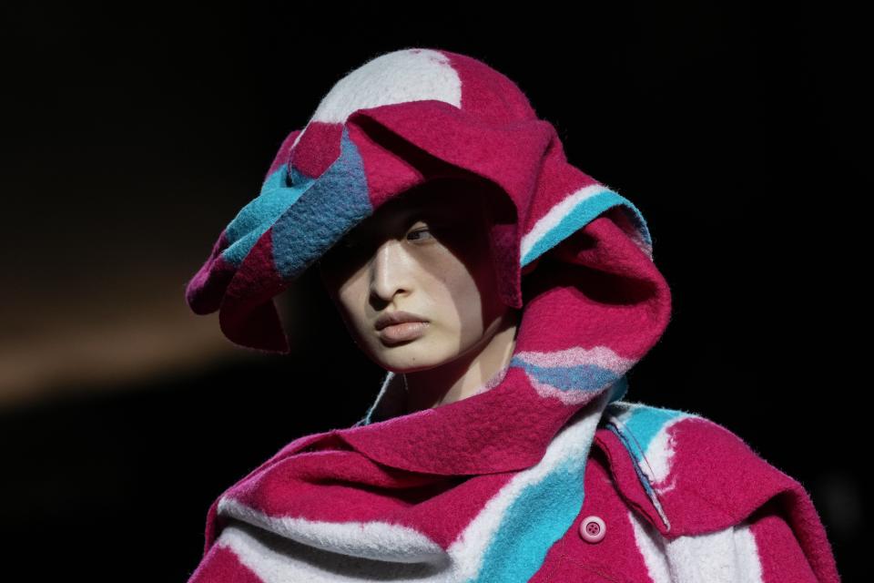 A model wears a creation as part of the Issey Miyake Fall/Winter 2024-2025 ready-to-wear collection presented Friday, March 1, 2024 in Paris. (Photo by Scott A Garfitt/Invision/AP)