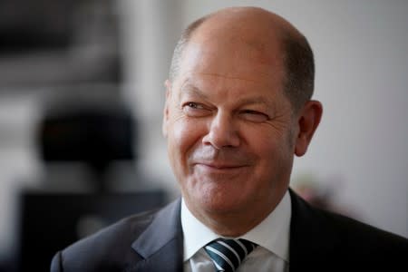 FILE PHOTO: German Finance Minister Olaf Scholz is pictured in his office during an interview with Reuters in Berlin