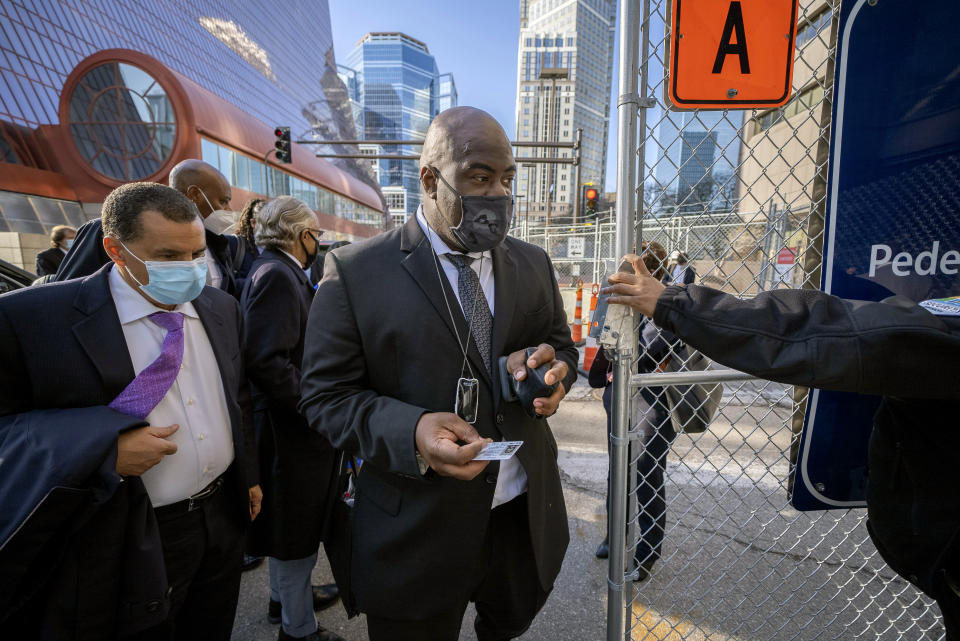 Rodney Floyd, brother of George Floyd, enters the Hennepin County Government Center Tuesday, April 6, 2021, in Minneapolis where testimony continues in the trial of former Minneapolis police officer Derek Chauvin. Chauvin is charged with murder in the death of George Floyd during an arrest last May in Minneapolis. (Mark Vancleave/Star Tribune via AP)