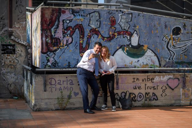 ROME, ITALY - OCTOBER 1: Matteo Salvini (Lega political party leader) and Giorgia Meloni (Fratelli d'Italia Leader) take a selfie before a press conference organized by right-wing parties, Lega, Fratelli d'Italia and Forza Italia as part of the closing of the electoral campaign for the Mayor of Rome Enrico Michetti, at Spinaceto district, on October 1, 2021 in Rome, Italy. The mayoral elections in Italy's major cities including Rome, Milan, Turin and Naples - previously due to be held between 15 April and 15 June - will be held between 15 September and 15 October, according to a decree approved by the cabinet due to the Coronavirus pandemic. (Photo by Antonio Masiello/Getty Images) (Photo: Antonio Masiello via Getty Images)