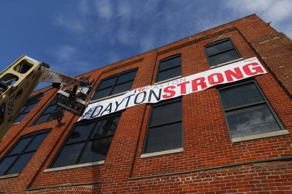 A banner bears the hashtag "#DAYTONSTRONG" after the mass shooting in the city. (Photo: ASSOCIATED PRESS)