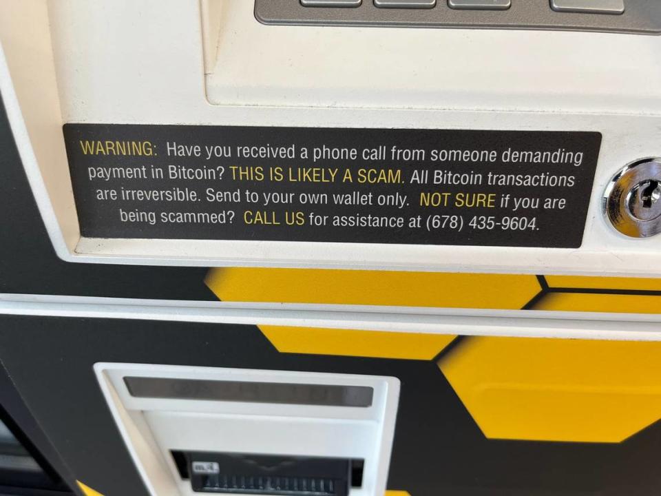 A consumer warning on a cryptocurrency ATM