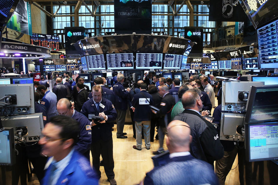 Traders on the floor of the NYSE. (Photo by Spencer Platt/Getty Images)