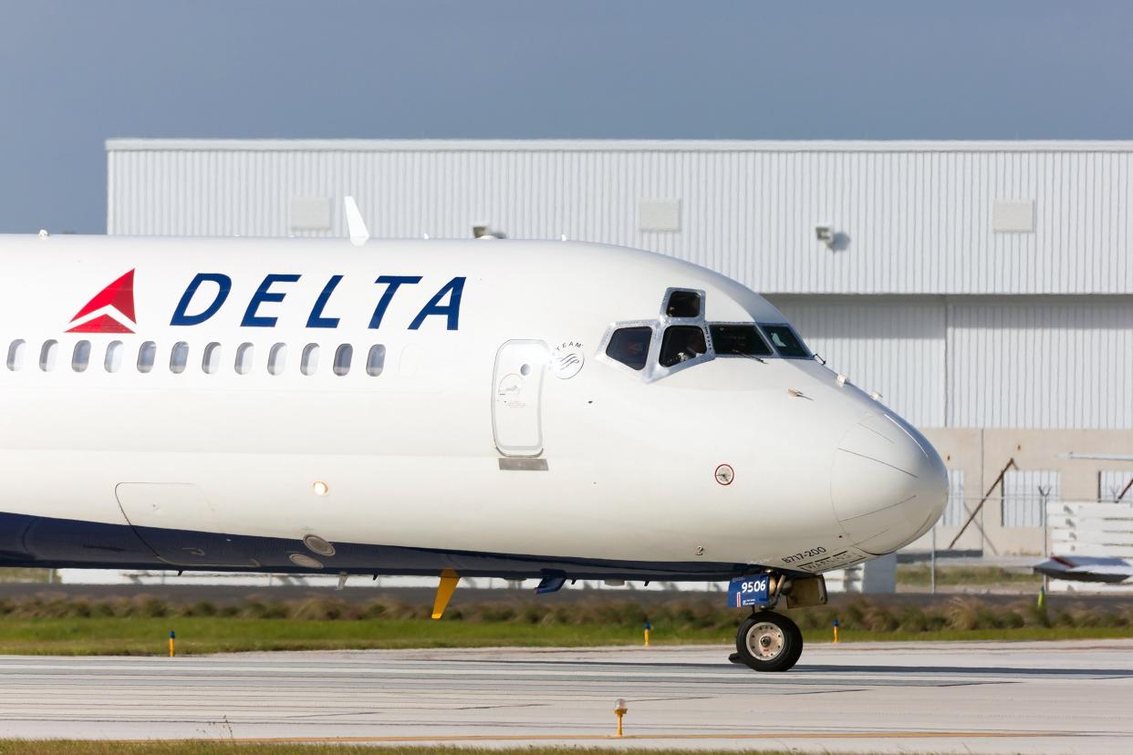 Delta Boeing 717 commercial aircraft taxing at the Fort Lauderdale International airport