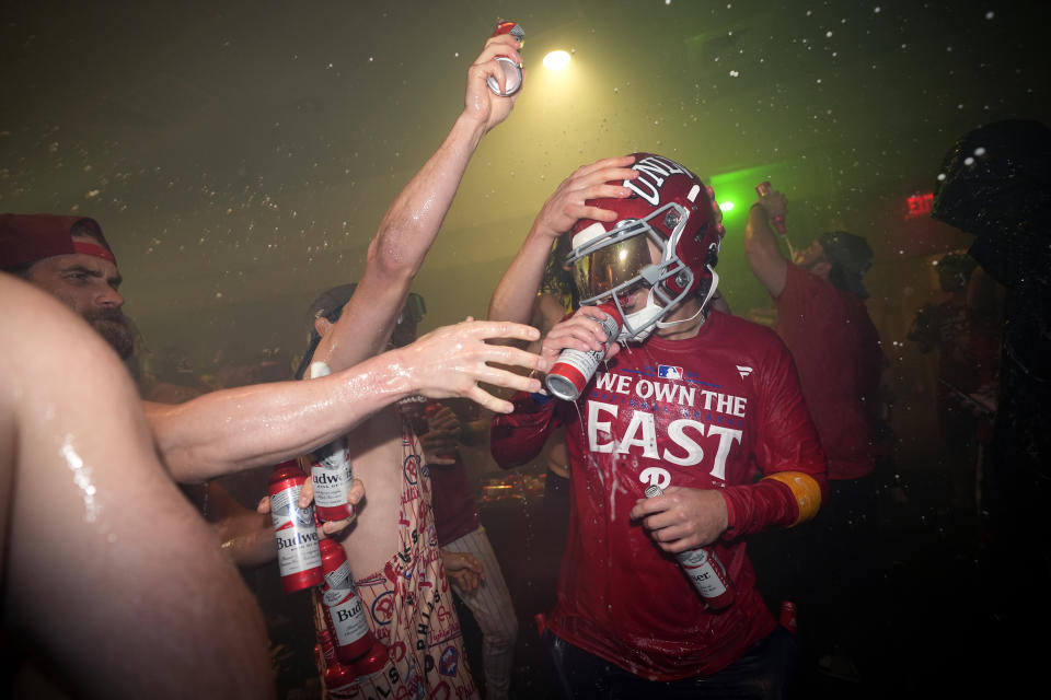 Bryson Stott of the Philadelphia Phillies celebrates after a baseball game, Monday, Sept. 23, 2024, in Philadelphia. (AP Photo/Matt Slocum)