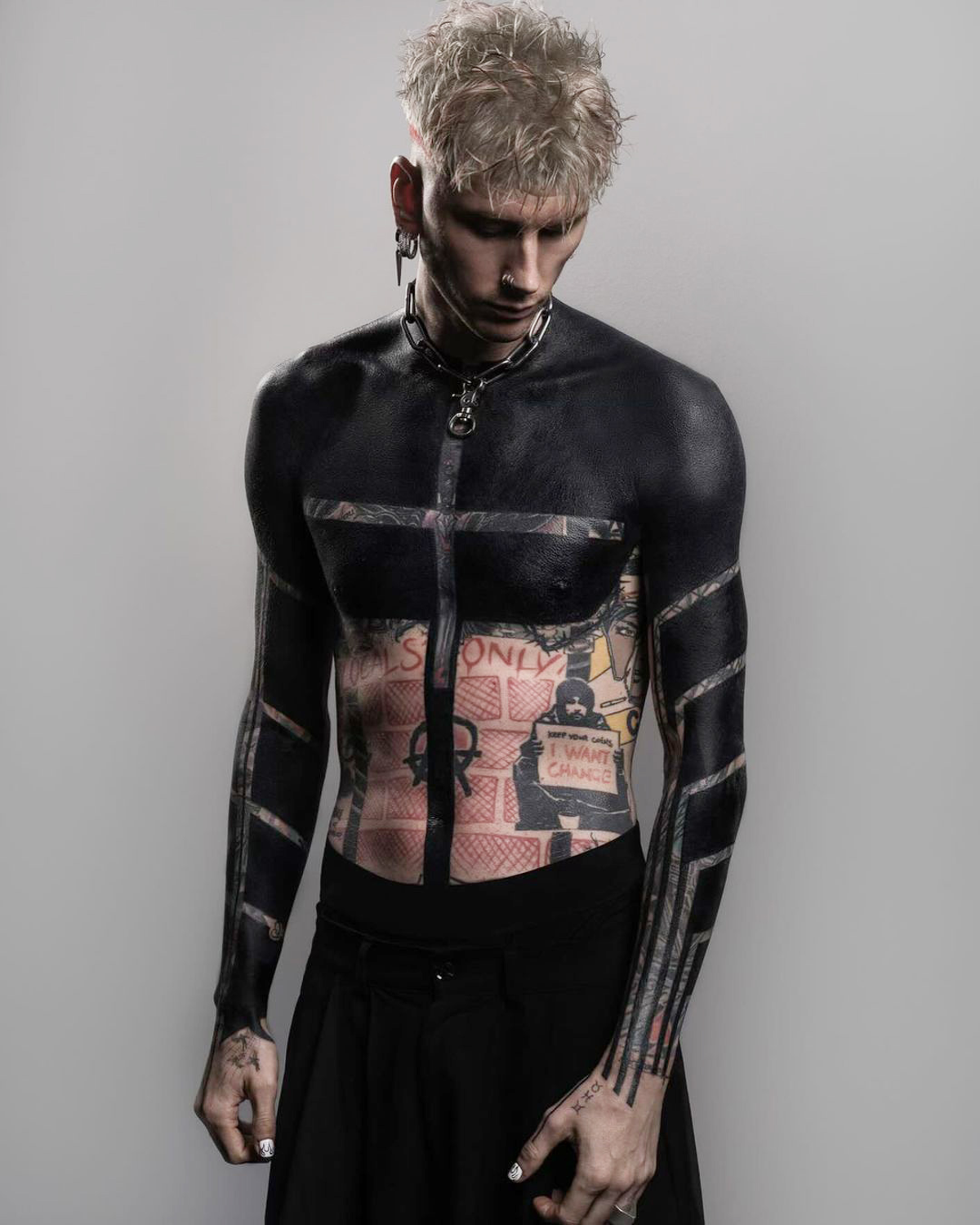 Machine Gun Kelly has unveiled his striking new upper body tattoo (Instagram / @machinegunkelly)