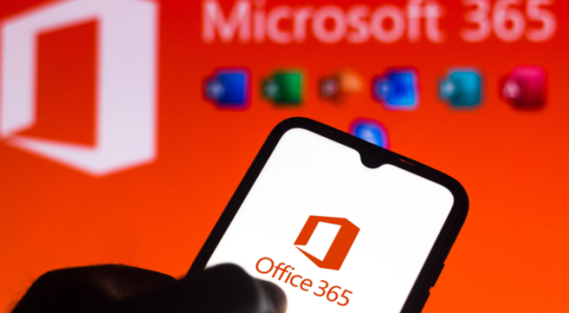 In this photo the Microsoft Office 365 logo is seen on a smartphone and a pc screen. AVPT stock, AVPT provides services for Microsoft (MSFT) products
