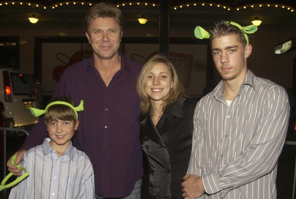 SYDNEY, AUSTRALIA - JUNE 9:  Television personality Richard Wilkins and his children Nick, Miranda and Christian Wilkins (L-R) attend the "Shrek2" Premiere at the State Theatre June 9, 2004 in Sydney, Australia. (Photo by Patrick Riviere/Getty Images)