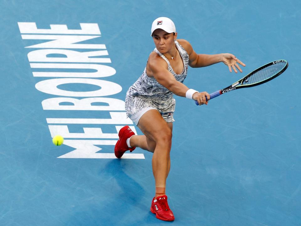 Ash Barty hits a backhand at the Australian Open.