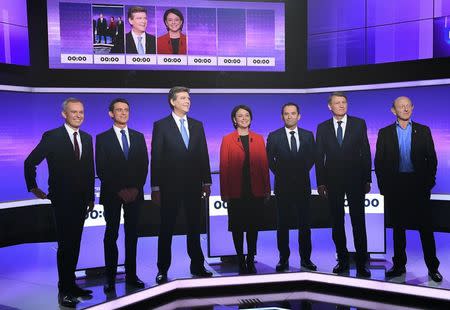 French politicians (LtoR) Francois de Rugy, Manuel Valls, Arnaud Montebourg, Sylvia Pinel, Benoit Hamon, Vincent Peillon and Jean-Luc Bennahmias attend the final prime-time televised debate for the French left's presidential primaries in Paris, France, January 19, 2017. REUTERS/Eric Feferberg/Pool