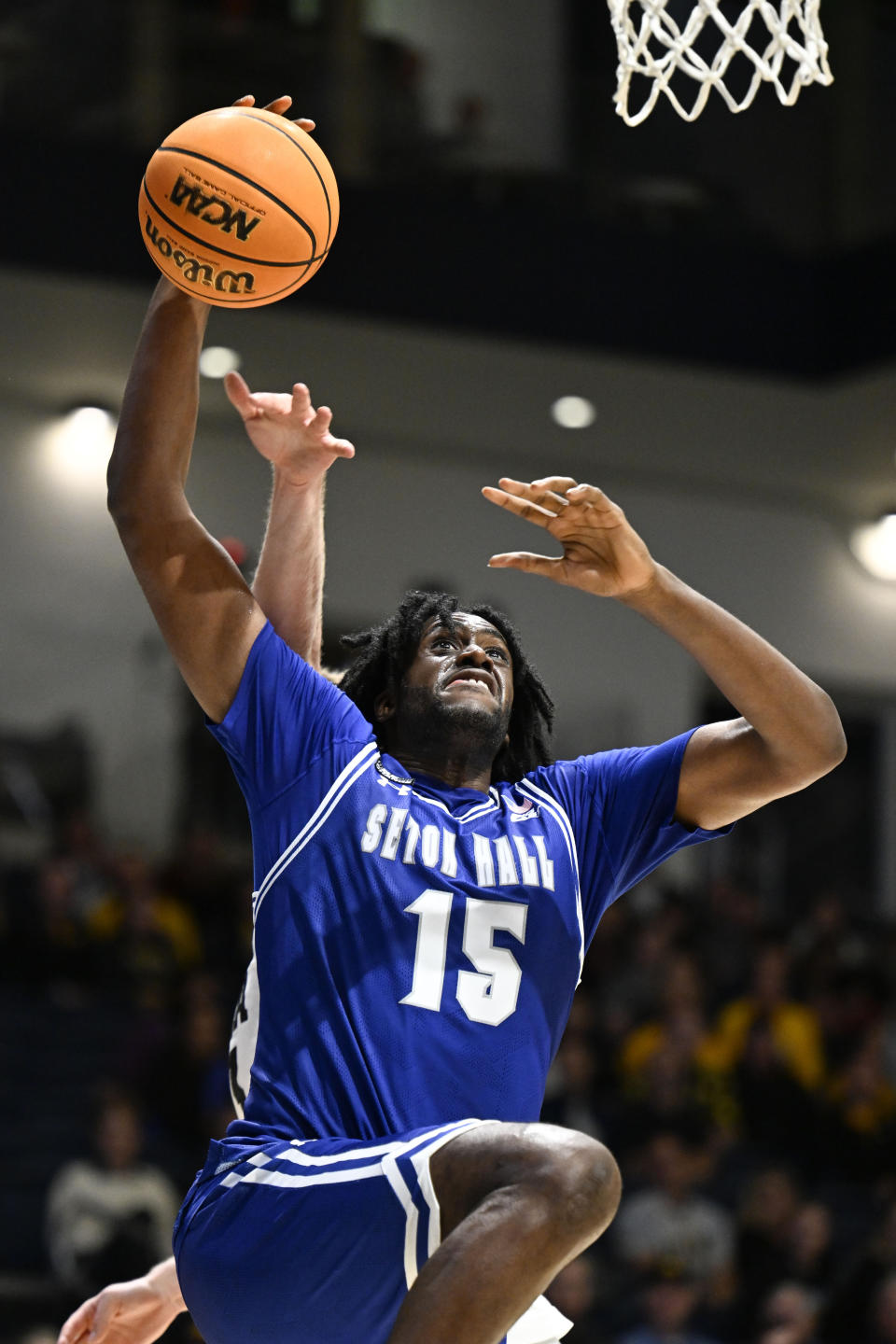 Seton Hall center Jaden Bediako (15) goes up to dunk during the second half of the team's NCAA college basketball game against Iowa Friday, Nov. 24, 2023, in San Diego. (AP Photo/Denis Poroy)