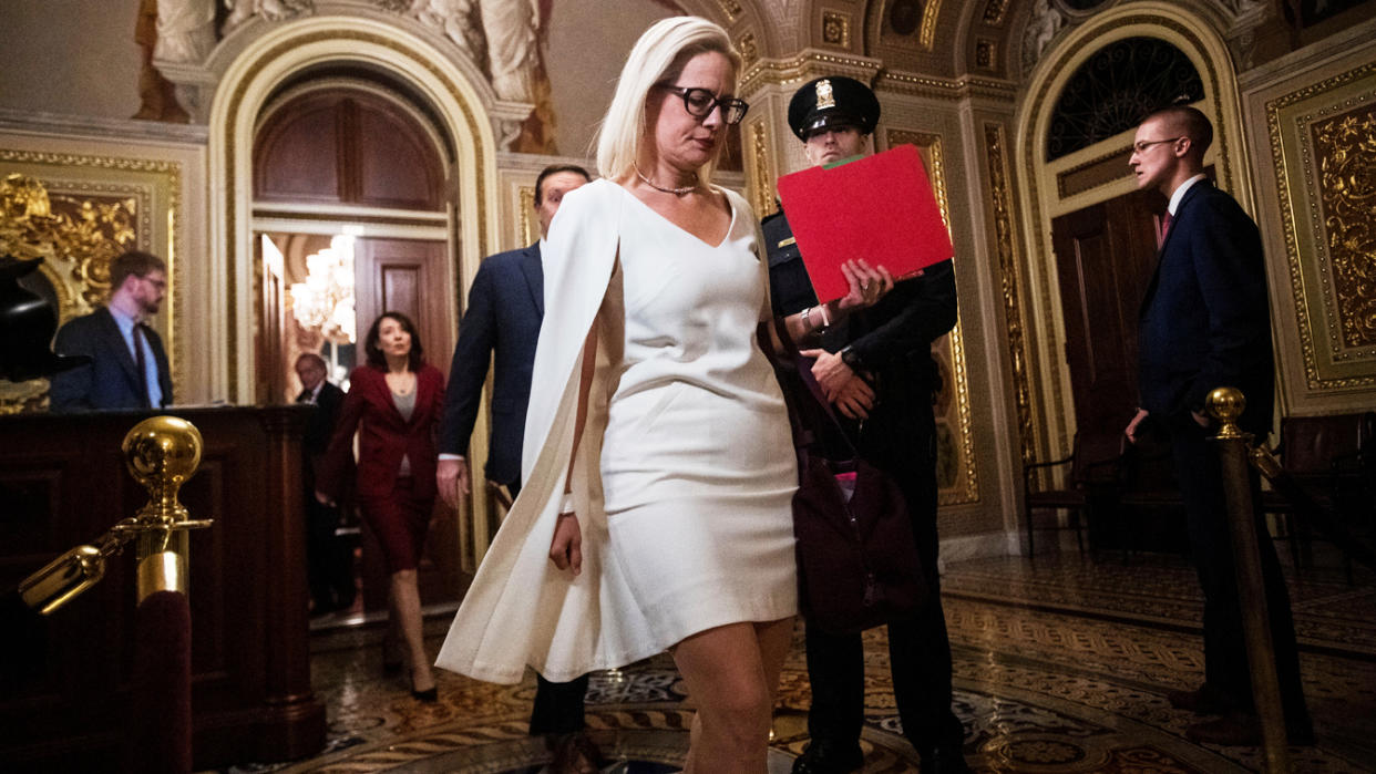 U.S. Senator Kyrsten Sinema (D-AZ) returns to the chamber following a recess at the U.S. Capitol during U.S. President Donald Trump's Senate impeachment trial in Washington, U.S., January 31, 2020. (Amanda Voisard/Reuters)