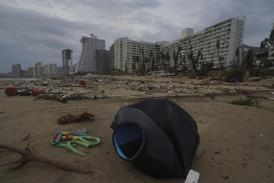 Debris lays on the beach after Hurricane Otis ripped through Acapulco, Mexico, Wednesday, Oct. 25, 2023. Hurricane Otis ripped through Mexico's southern Pacific coast as a powerful Category 5 storm, unleashing massive flooding, ravaging roads and leaving large swaths of the southwestern state of Guerrero without power or cellphone service. (AP Photo/Marco Ugarte)