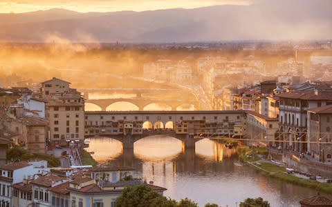 Ponte Vecchio is a reminder of how most bridges used to look - Credit: Getty