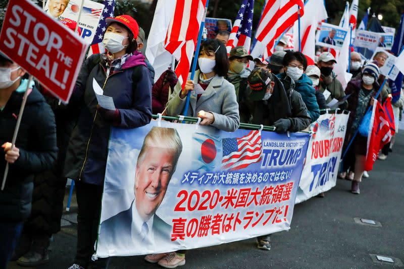 Supporters of U.S. President Donald Trump hold a rally, in Tokyo