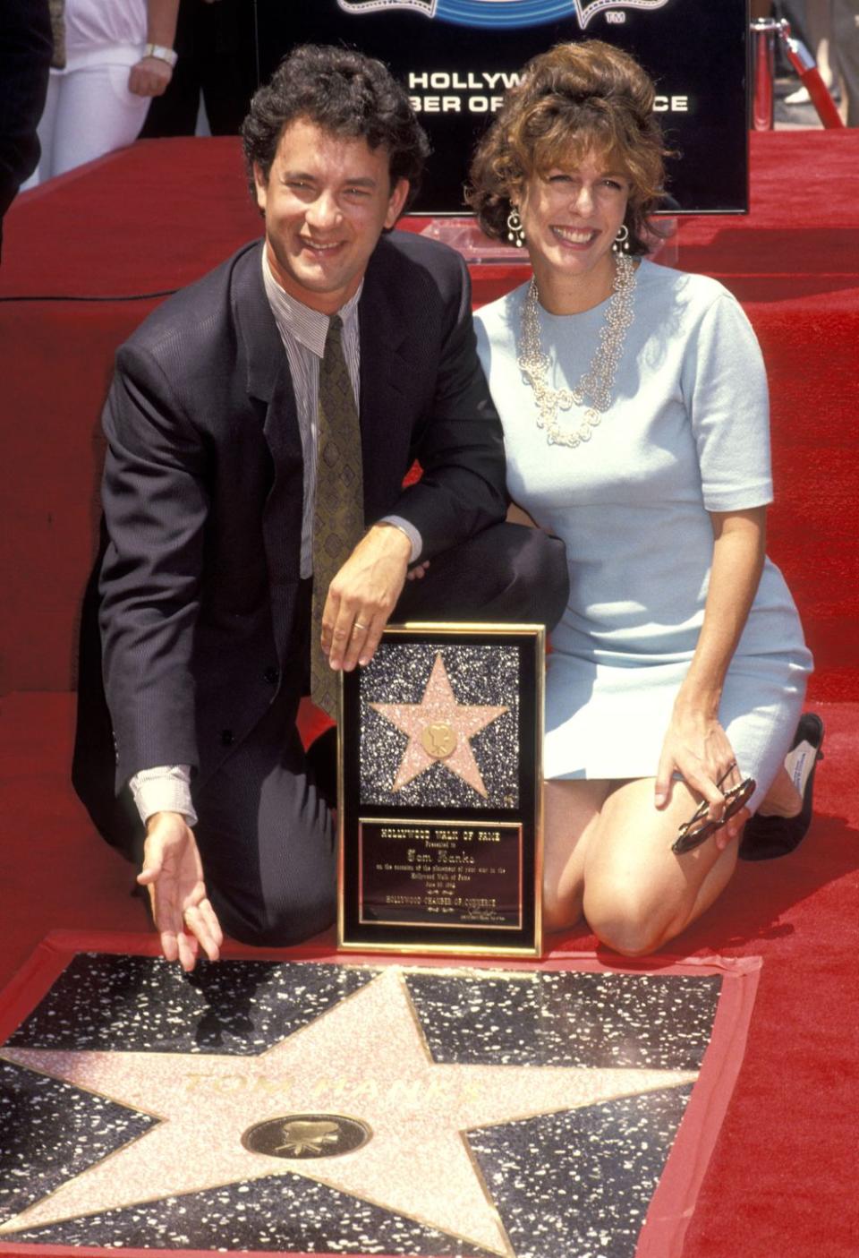 1992: Tom Hanks cheese for the cameras with Rita