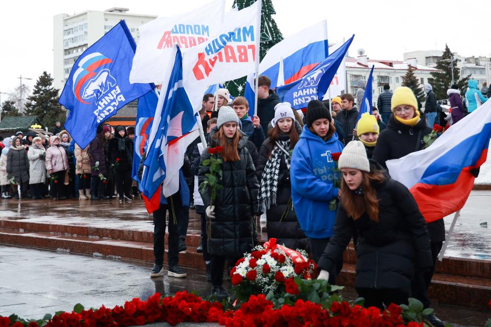 Mourners gather to lay flowers in memory of Russian soldiers killed in a Ukrainian strike on Russian-controlled territory, in Samara, on Tuesday. 