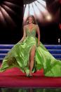 <p>Marisa Moorhouse of New Hampshire made sure she stole the show with this green gown. She sure knows how to work a train.</p>
