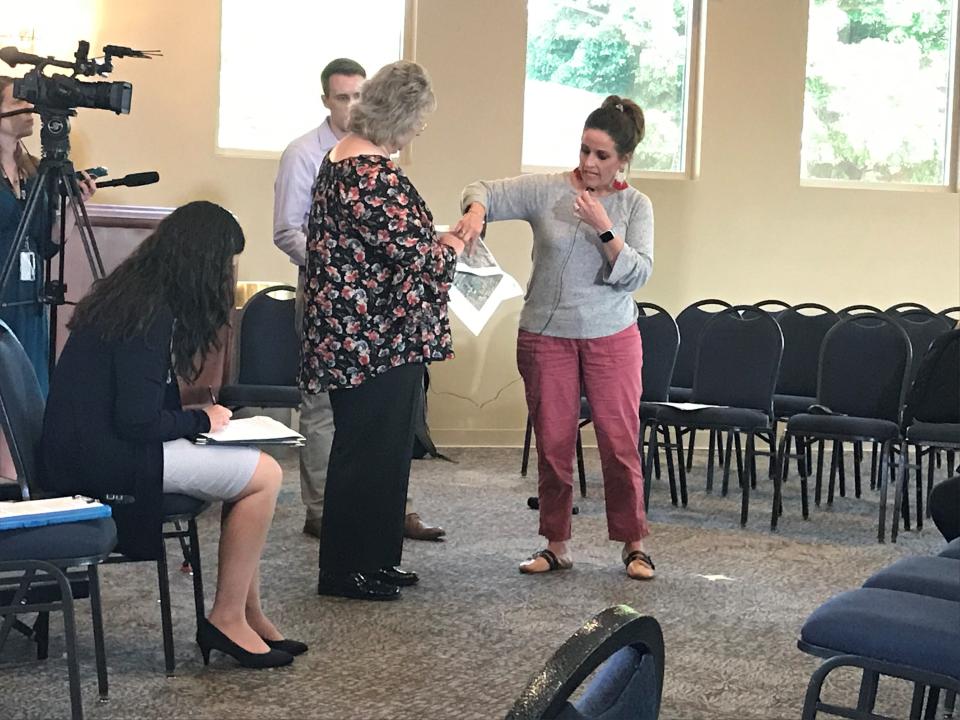 Dr. Mary Beth Hensley, a doctor in Franklin, shows officials from the EPA Office of Inspector General a map of cancer cases around the city in relation to a known contaminated site. The OIG hosted in meeting in Franklin Wednesday, May 8 as part of a review into whether the environmental agency adequately communicated risks from cancer-causing chemicals polluting the city.