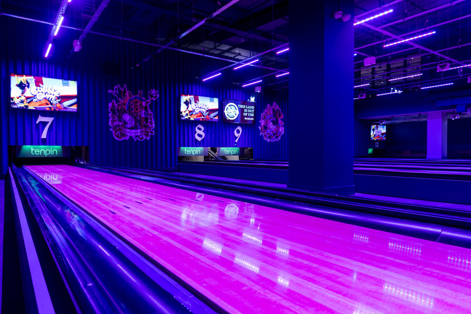 pink bowling lane and blue wall