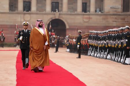 Saudi Arabia's Crown Prince Mohammed bin Salman inspects a honour guard during his ceremonial reception at the forecourt of Rashtrapati Bhavan in New Delhi, India, February 20, 2019. REUTERS/Adnan Abidi