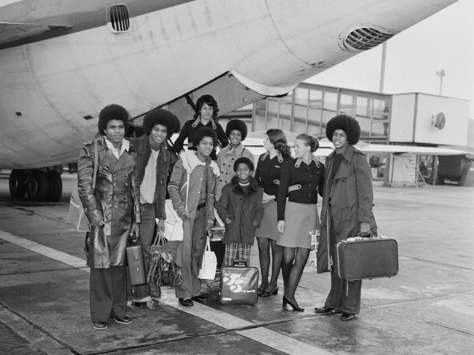 American singing group the Jackson Five leave from London Airport for Amsterdam, 2nd October 1972. From left to right, brothers Tito, Jackie, Marlon, Michael (behind), Randy and Jermaine Jackson.