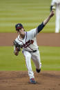 Atlanta Braves starting pitcher Max Fried works against the Miami Marlins in the first inning of a baseball game Wednesday, Sept. 23, 2020, in Atlanta. Fried left the game after the first inning with an ankle injury. (AP Photo/John Bazemore)