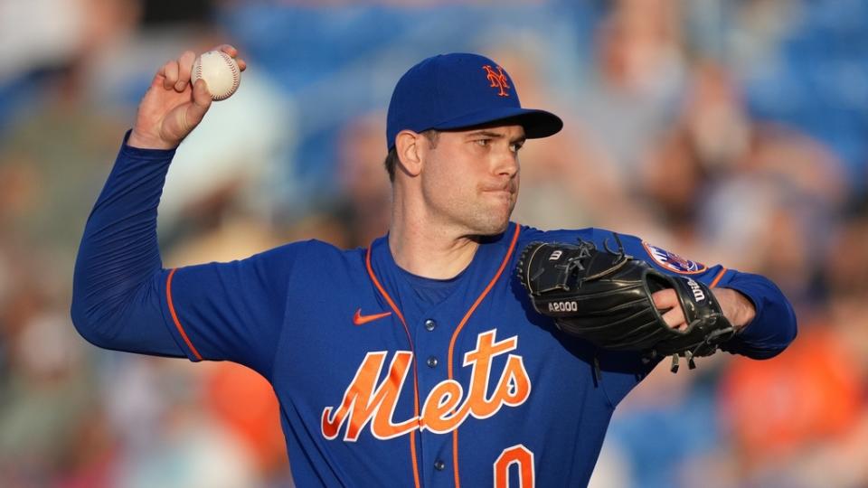 Mar 22, 2022;  Port St.  Lucie, Florida, USA;  New York Mets relief pitcher Adam Ottavino (0) delivers a pitch in the third inning of the spring training game against the Houston Astro at Clover Park.  Mandatory Credit: Jasen Vinlove-USA TODAY Sports