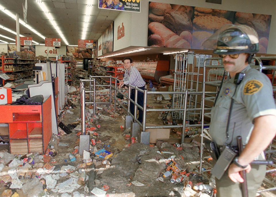 Sheriff’s deputy outside looted store