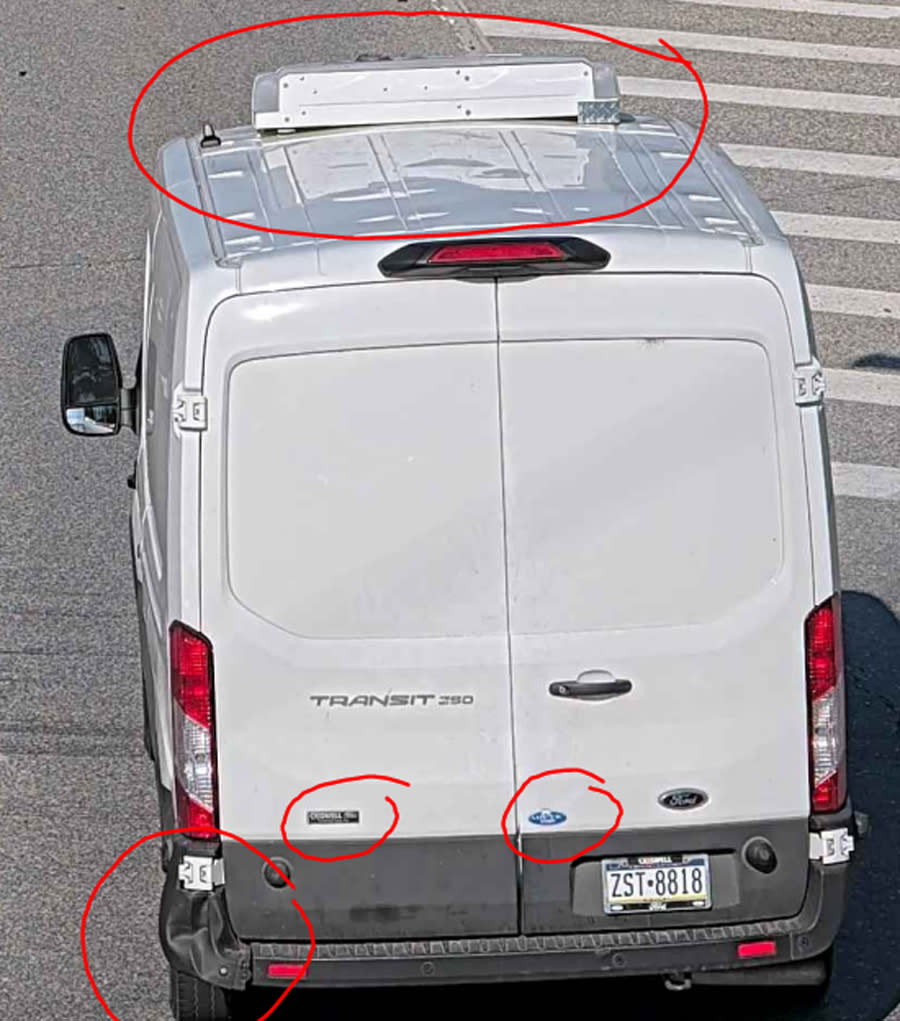 Image of white van with cooling unit and damaged fender.  (via U.S. Marshals Service Philadelphia )