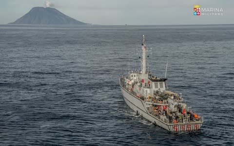 The wreck was located off Stromboli, seen in the background, by an Italian minesweeper - Credit: Marina Militare