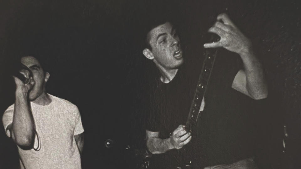 The Dillinger Escape Plan’s Dimitri Minakakis [left] and Ben Weinman on stage near the turn of the century