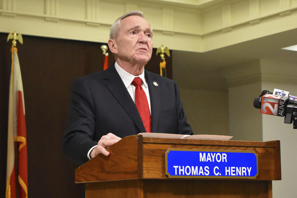 FILE - Fort Wayne Mayor Tom Henry speaks with reporters and city staff, Feb. 26, 2024, in Fort Wayne, Ind. Indiana Democratic House leader state Rep. Phil GiaQuinta intends to run for Fort Wayne mayor in an upcoming caucus to replace the city's late mayor who died last week, an adviser to the lawmaker confirmed Wednesday, April 3. (Corey McMaken/The Journal-Gazette via AP, File)