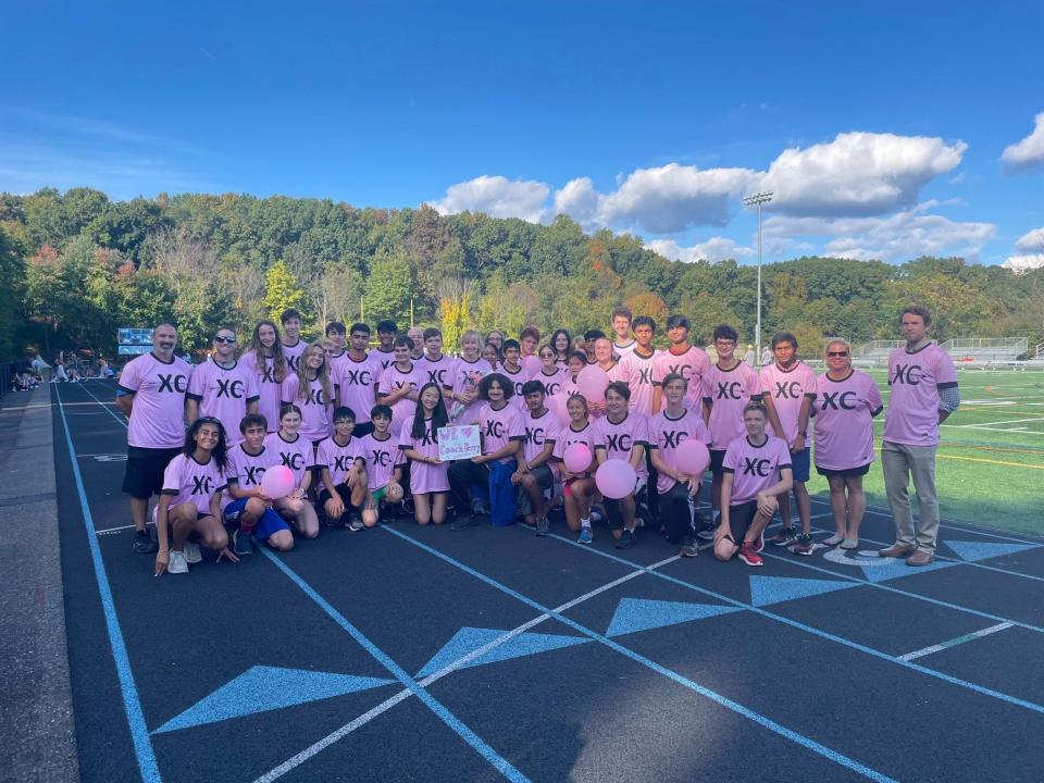 The Parsippany Hills cross country team honored head coach Michelle Perry after breast-cancer treatment.