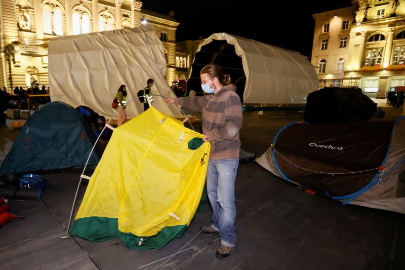 Climate change activists take part in a demonstration called "Rise up for change" in Bern