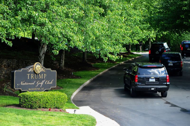 U.S. President Donald Trump's motorcade arrives at Trump National Golf Club in Sterling